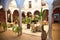 Beautiful interior courtyard with columns and plants of the reception of a luxurious hotel. Travel concept, rooms, buildings,