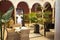 Beautiful interior courtyard with columns and plants of the reception of a luxurious hotel. Travel concept, rooms, buildings,