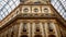 Beautiful interior of Galleria Vittorio Emanuele, frescoes and reliefs