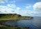 Beautiful Irish coast blue sky and white clouds