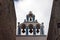 Beautiful island of Santorini, Greece. White Church with a bell tower and old bells in the city of Oia on the island of Santorini