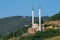 A beautiful isolated mosque with two tall minarets, built on a hill near the city of Prizren, Kosovo