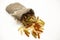 Beautiful Italian pasta Fusilli from durum wheat in a linen sack, closeup on a white background