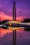 Beautiful Jakarta in colorful sunset, monument reflected on water, Jakarta, Indonesia