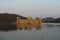 Beautiful Jal Mahal water palace with birds in evening light
