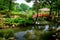 Beautiful Japanese Garden in Hiroshima with red bridge