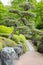 Beautiful japanese style garden with walkway and japan ancient tree at Kawaguchiko