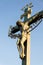 Beautiful Jesus Christ crucifixion bronze statue during sunrise, Statuary of the St. Cross with Calvary, Charles Bridge, Prague