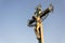 Beautiful Jesus Christ crucifixion bronze statue during sunrise, Statuary of the St. Cross with Calvary, Charles Bridge, Prague