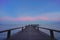 Beautiful jetty walkway on the sea in twilight time