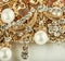 Beautiful jewelry background with gold and pearls