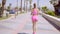 Beautiful jogger wearing pink shorts and top