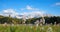 Beautiful karwendel mountains, lake Geroldsee and forest, rarely bogbean flowers in the front