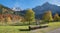 Beautiful karwendel mountains and landscape in autumn, wooden drinking trough