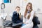 Beautiful kid boy smiling in dentist`s chair and showing thumbs up gestures of good class