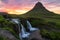 Beautiful Kirkjufell mountain under a stunning midnight summer sky