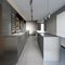 Beautiful kitchen with dark furniture of an new loft