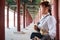 Beautiful Korean woman dressed Hanbok in Gyeongbokgung Palace in Seoul