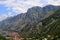 Beautiful Kotor Bay and old city Kotor surrounded by high mountains in Montenegro. Full top view boka kotorska