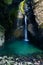 Beautiful Kozjak waterfall hidden in canyon near Kobarid in Slovenia