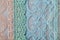 Beautiful laces on a shabby background, a textile product with an ornamental design, light transparent mesh patterned fabric