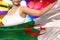 beautiful lady holds Algeria flag in front on the party lights - flag concept 3d illustration