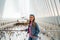 Beautiful lady standing inside World Trade Center Transportation Hub or The Oculus designed by Santiago Calatrava architect in