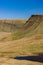 A beautiful lake at the foot of steep-sided mountains Llyn y Fan Fach, Brecon Beacons, Wales