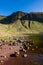 A beautiful lake at the foot of steep-sided mountains Llyn y Fan Fach, Brecon Beacons, Wales