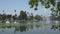 Beautiful lake and fountain in a park in the summer time