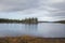 A beautiful lake landscape in Femundsmarka National Park in Norway. Lake with a distant mountains in background.