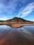 Beautiful lake reflection landscape with island in the middle