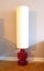 Beautiful lamp from the 70s with white lampshade and red glass base