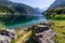 Beautiful landscape of alpine lake with crystal clear green water and mountains in background, Gosausee, Austria