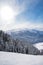 Beautiful landscape of the Arkhyz ski resort with mountains, snow, forest and track on a sunny winter day. Caucasus  Mountains,