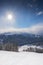 Beautiful landscape of the Arkhyz ski resort with mountains, snow, forest and track on a sunny winter day. Caucasus  Mountains,