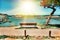 Beautiful landscape of beach and coast with mountains and vegetation. Lonely bench on a cliff facing the sea Cantabria, Spain.