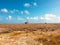 Beautiful landscape, blue sky and old lighthouse tower on Klein