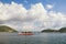Beautiful landscape with blue sky and white clouds. Montenegro, ferry runs across narrowest part of Bay of Kotor - Verige Strait