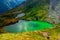 Beautiful landscape of Capra lake in Fagaras Mountains