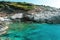 Beautiful landscape of the Caribbean sea with forested rocky cliffs in the Tremiti islands