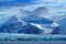 Beautiful landscape. Cold sea water. Land of ice. Travelling in Arctic Norway. White snowy mountain, blue glacier Svalbard, Norway