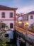 Beautiful landscape of colonial style buildings and old bridge in a cloudy sunset in Ouro Preto, Brazil. Ouro Preto was designed a