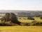 beautiful landscape country green grass lush hills clouds sky en