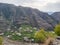 Beautiful landscape   cover with houses  fields  mountains  and  sky sky  field