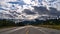 Beautiful landscape with diminishing perspective of Yellowhead Highway north of McBride in Robson Valley, Canada in autumn.