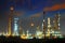 beautiful landscape dusky sky of heavy industry oil refinery plant with dazzled lighting