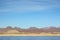 Beautiful landscape. Egyptian mountains and the red sea. Light clouds in the blue sky.