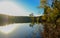 Beautiful landscape in an evening mood by the water in the sunshine.