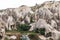 beautiful landscape with famous caves and rock formations in goreme national park,